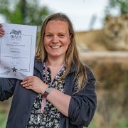 Lisa Holmes pictured at Chester Zoo with her BIAZA award