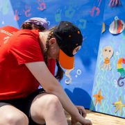 Two girls pictured at Chester Zoo creating arts and crafts activity