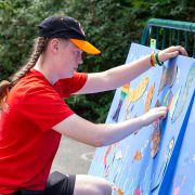 A girl pictured at Chester Zoo creating arts and crafts activity