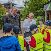 School children pictured talking to zoo visitors at Chester Zoo