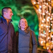 A man and a woman smiling at Chester Zoo's Lanterns and Light