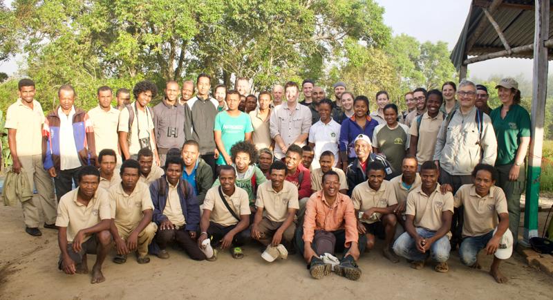 Image shows the Madagasikara Voakajy and Chester Zoo teams in a group shot during an expedition - about 50 people