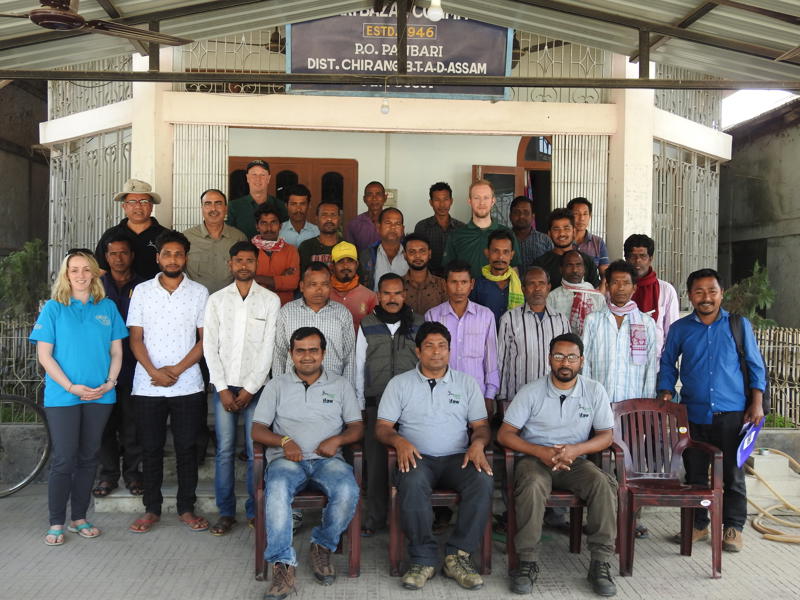 A photo showing dozens of people (mostly men) at a consultation for the Haathi watchers Assam