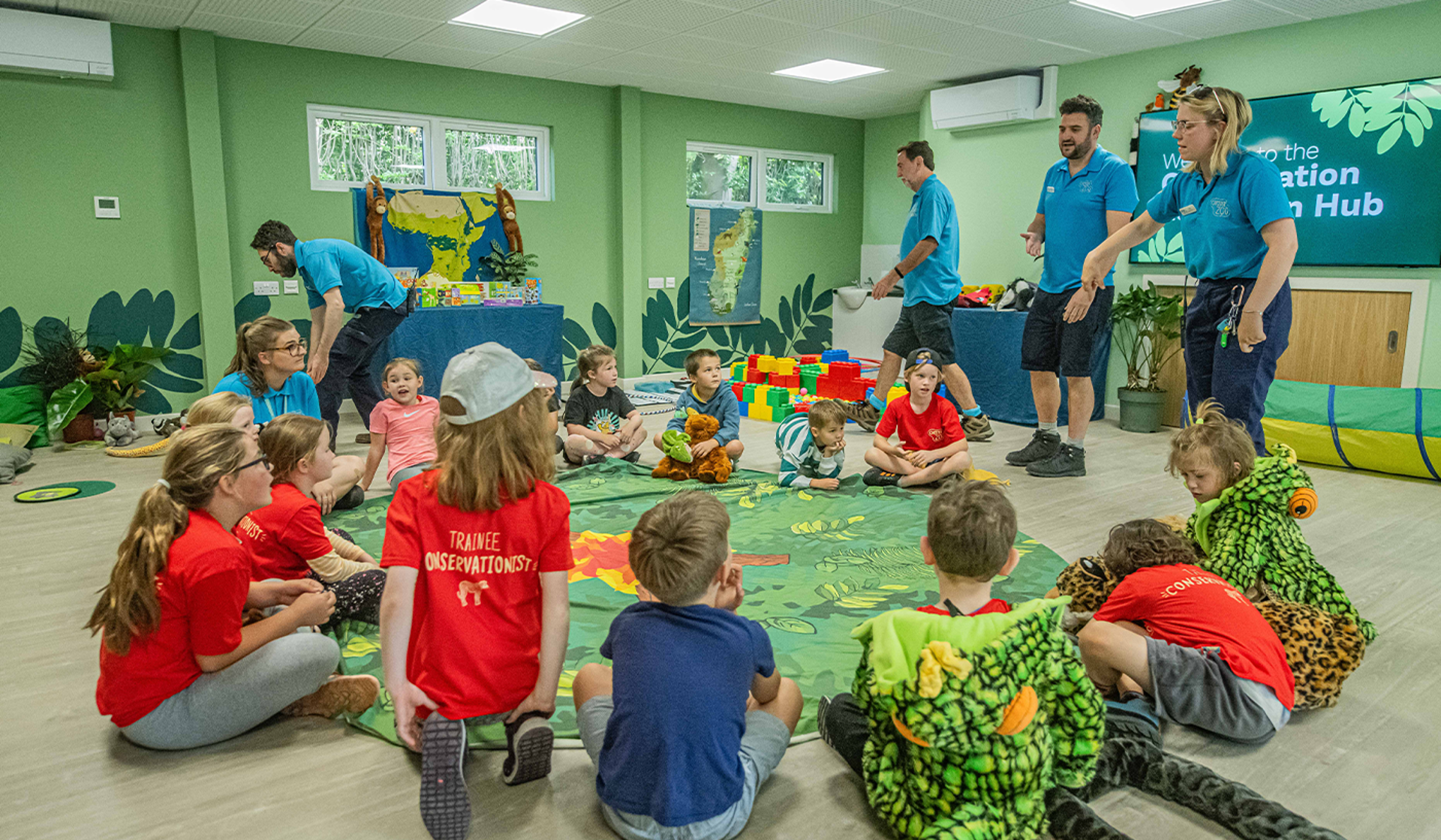 Children Sat In A Circle Inside The Conservation Education Hub