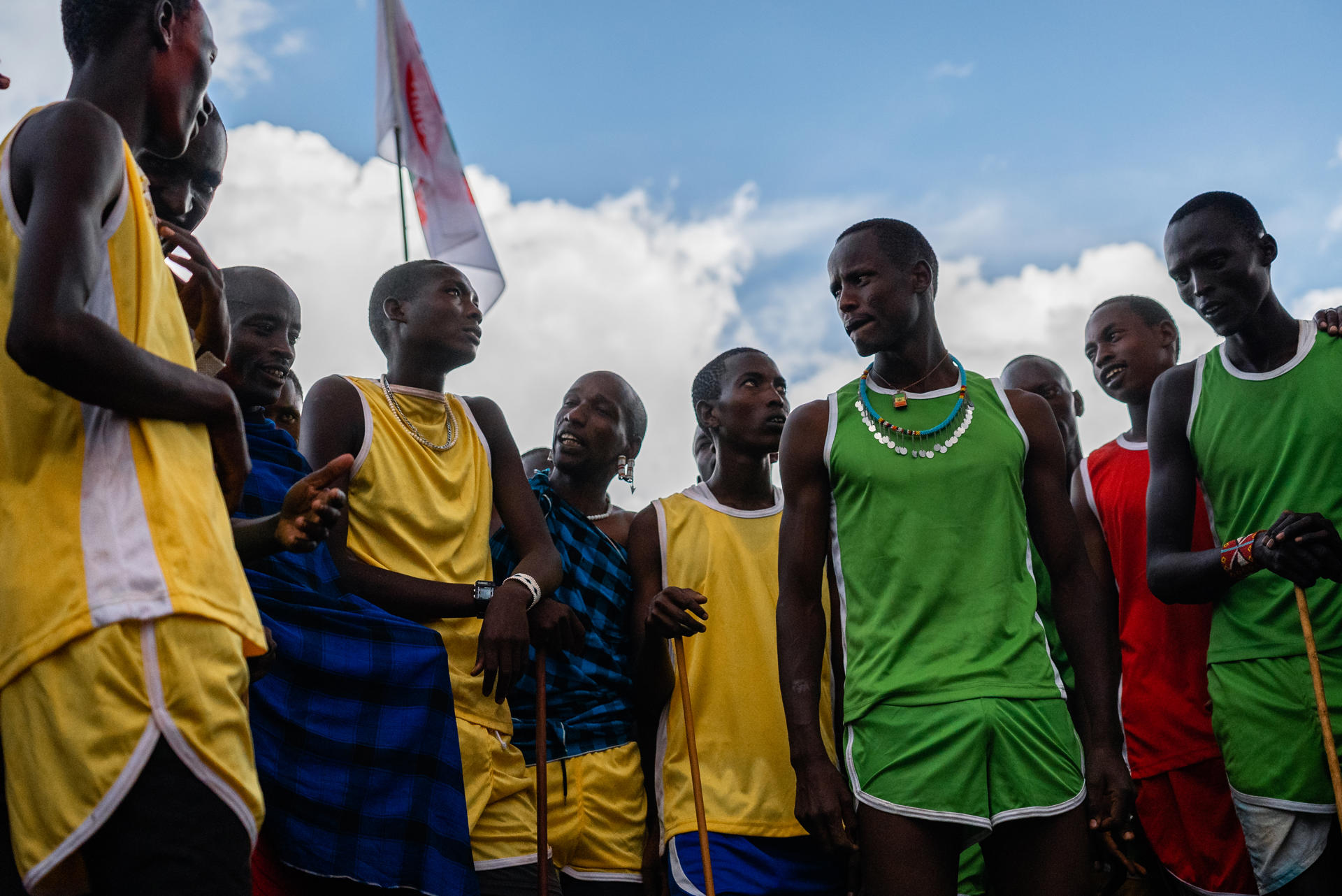 A group of Maasai men in team colours at the Maasai olympics